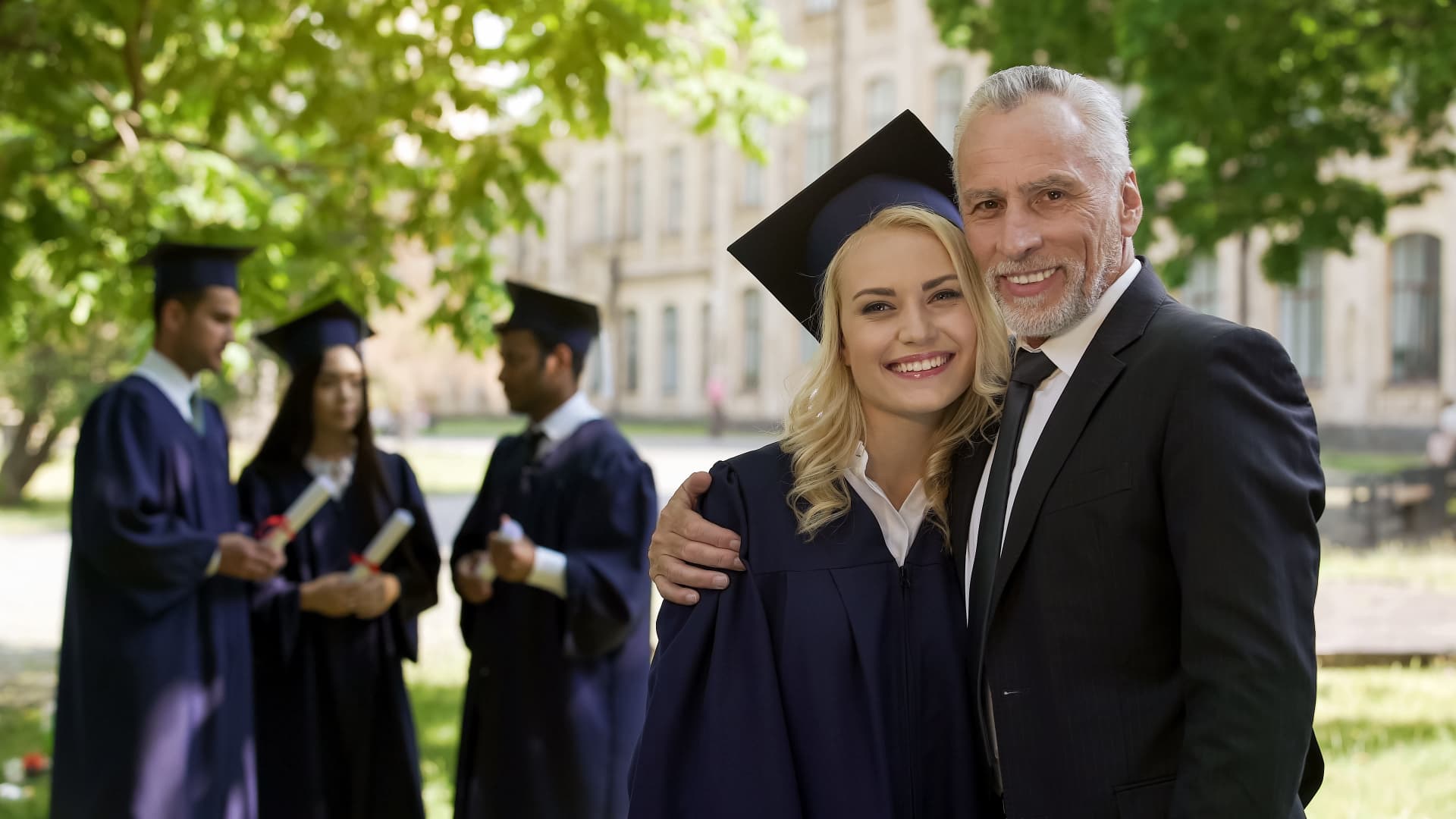 Graduate with parent celebrating success